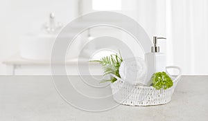 Purity concept with decorated bathroom accessories on stone table
