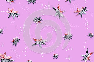 Purple abstract festive background with a pattern of stars, covered with natural snow,