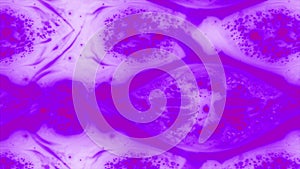 Purple abstract rippling alcohol ink.