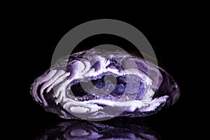 Purple Agate Druse in front of Black