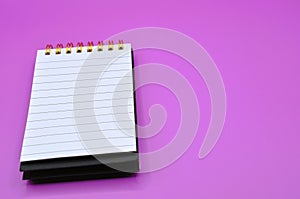 purple background with empty notebook