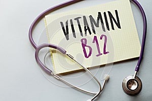 On a purple background a stethoscope with yellow list with text vitamin b12