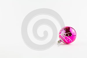 Purple ball for christmas tree on white background