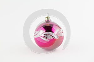 Purple ball for christmas tree on white background