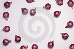 Purple beautiful Christmas balls on a light background