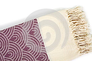 Purple and beige towel folded colorful textile for spa, beach, pool, light travel, healthy fashion and gifts. Tr