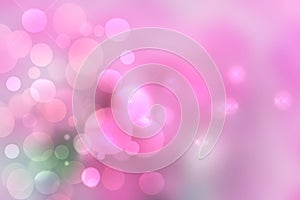 Purple bright abstract bokeh. Purple and pink gradient glowing background with bright blurred circles and glittering stars.