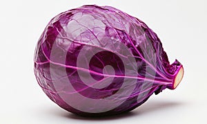 A purple cabbage is sitting on a white surface