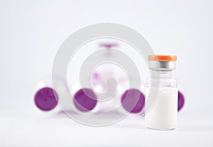 Purple cap injection vial show medicine concept