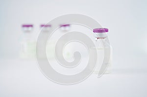 Purple cap of medicine vial