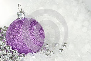 Purple Christmas bauble with silver beads