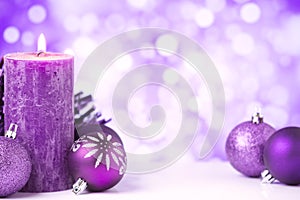 Purple Christmas scene with baubles and candles