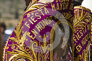 purple clothes and gold threads, used by parishioners in the main festival of apurimac, lord of the souls of chalhuanca national