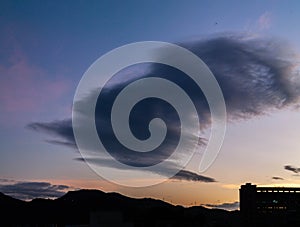 purple cloud flying in the dusk