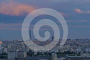 Purple Clouds Over Paris and Eiffel Tower With Buildings