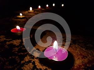 Purple color candle in dard room