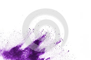 Purple color powder explosion on white background.