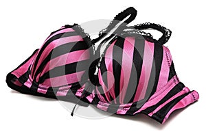 A purple colored padded brassiere with black stripes, laces and straps