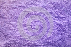 Purple crumpled paper background with a pronounced texture.