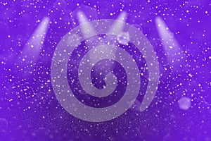 Purple cute brilliant glitter lights defocused stage spotlights bokeh abstract background with sparks fly, holiday mockup texture