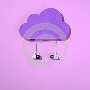 Purple data storage cloud and headphones concept of internet online information