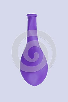 Purple deflated balloon, vertical image.