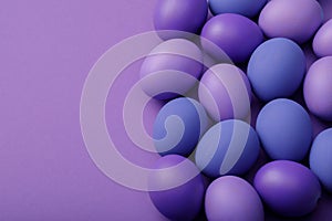 Purple easter eggs on a paper background