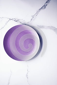 Purple empty plate on marble table background, tableware decor for breakfast, lunch and dinner for restaurant brand menu recipe,