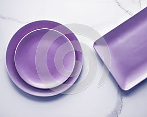 Purple empty plate on marble table background, tableware decor for breakfast, lunch and dinner for restaurant brand menu recipe,