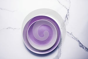 Purple empty plate on marble table background, tableware decor for breakfast, lunch and dinner for restaurant brand menu recipe,