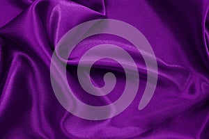 Purple fabric cloth texture for background and design art work, beautiful crumpled pattern of silk or linen