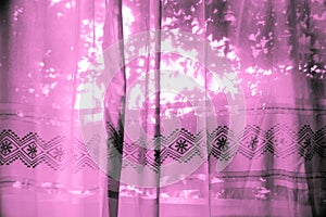 Purple fabric curtains with light