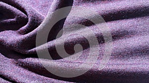 Purple fine merino wool knit. Violet knitted fabric.