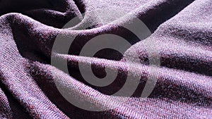 Purple fine merino wool knit. Violet knitted fabric.