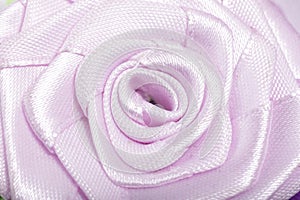 Purple flower broche that made of satin ribbon photo
