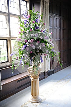 Purple flowers at wedding.