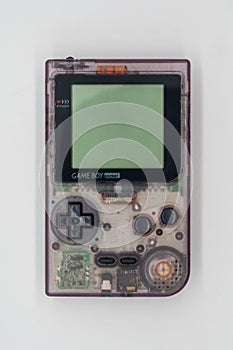 Purple Game Boy Pocket, Vintage portable game by Nintendo. Illus