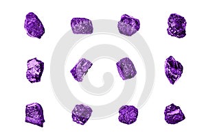 Purple gem stones white background isolated close up, raw gemstones, mineral samples, amethyst, sapphire, topaz, spinel, tanzanite