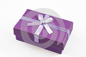 Purple gift box with ribbon