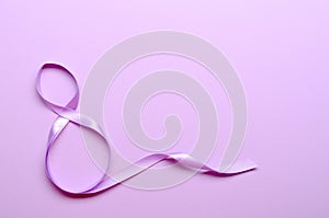 Purple gift celebration ribbon in 8 namber over purple background. 8 march concept.