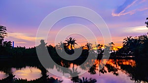 Purple glowing sunset with refection