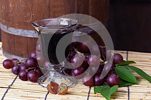 Purple grapes with grape juice