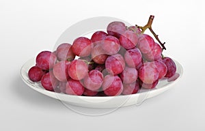 Purple grapes on saucer