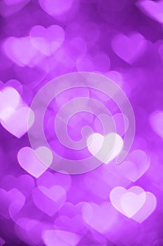 Purple heart bokeh background photo, abstract holiday backdrop