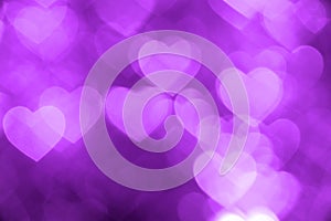 Purple heart bokeh background photo, abstract holiday backdrop photo