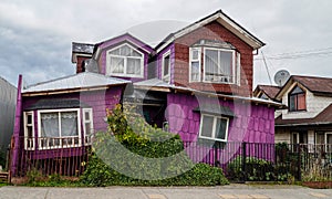 Purple house in Chiloe, Chile.