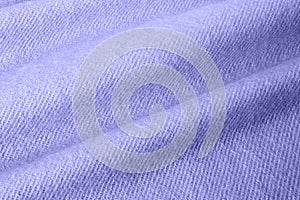 Purple knitted acrylic fabric texture with soft folds