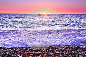 Purple landscape with sea and sunset