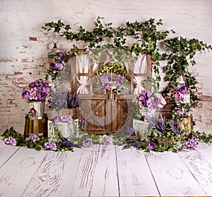 Purple lavender spring sett up with colourful flowers pink , purple, vintage wood parquet