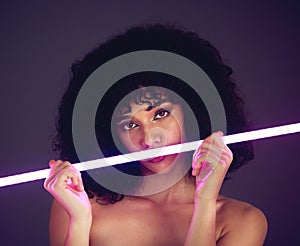 Purple light, woman and beauty portrait in studio with neon uv fashion for makeup cosmetics. Face of aesthetic gen z